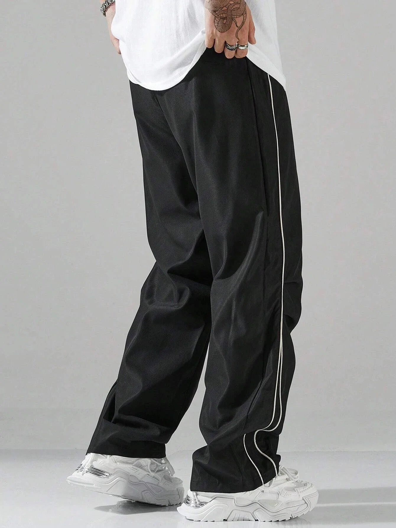 Larbulse męskie spodnie z kontrastowym wykończeniem modne spodnie na co dzień jednokolorowe oddychające luźne proste spodnie ze sznurkiem Streetwear — zdjęcie 2
