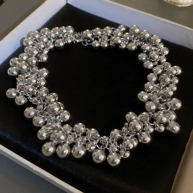

LuxeGlint Silver Sphere Bracelet