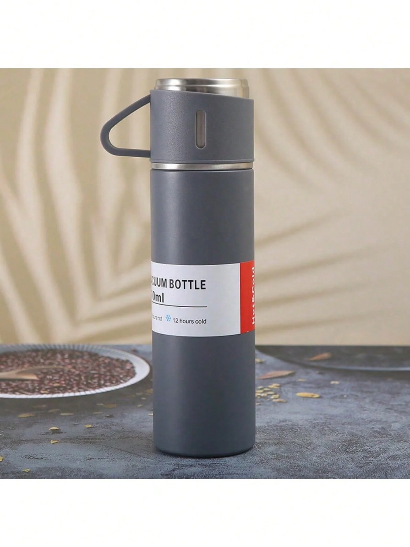 Thermos Vacuum water bottle for hot and cold drinks with 3 cups.