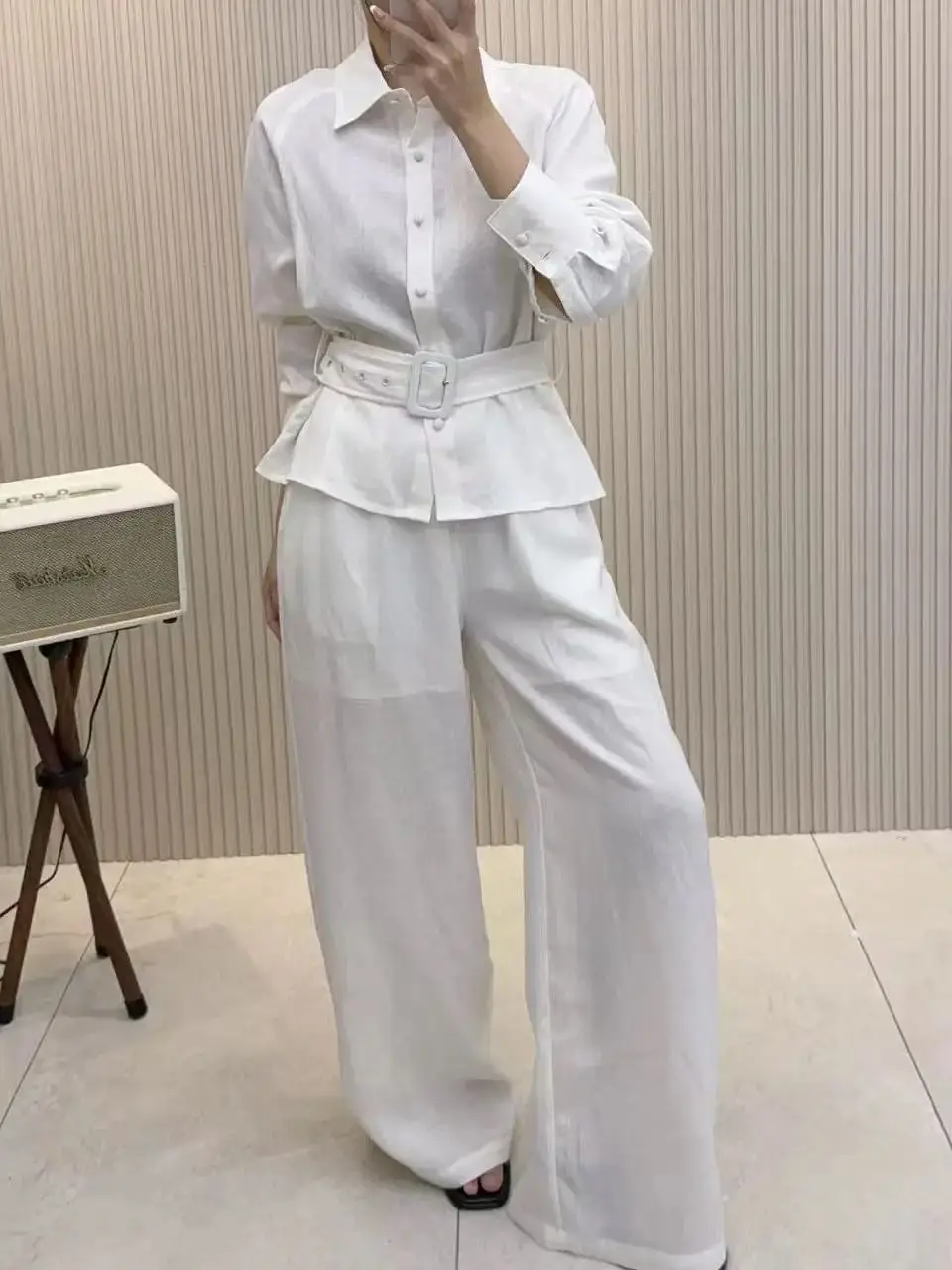 

Elegant casual spring-summer linen trouser suit with belt
