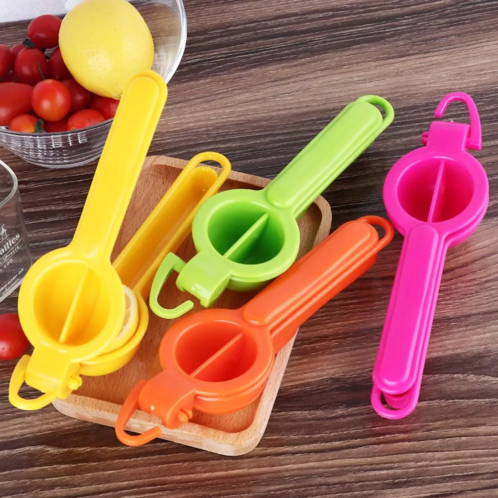 Exprimidor manual, fácil de usar, ligero, suave. Exprimidor de limón. Exprimidor de naranjas, limas, frutas. 23*6.5cm Herramientas de cocina. Utensilios. El color se envía al azar