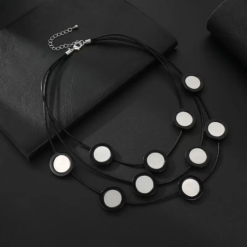 

Boho Chic Multi-Strand Necklace for Women – Black Cord with Silver Round Pendants