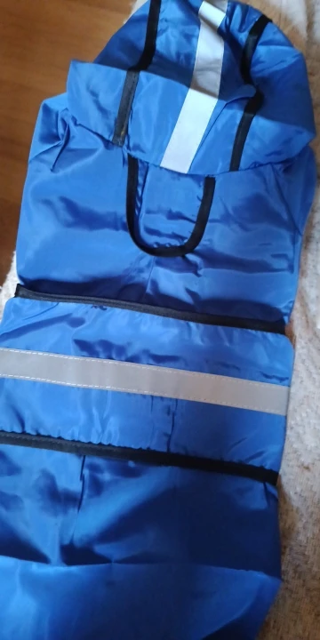 Customer review photo for Waterproof Dog Raincoat — Adjustable, Windproof & Hooded