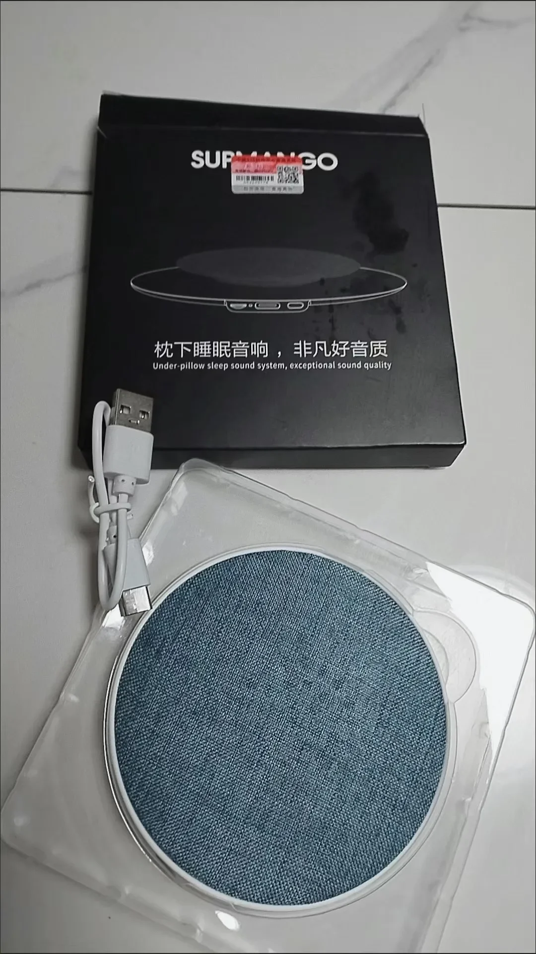 Customer photo of the PillowTone paired to a phone