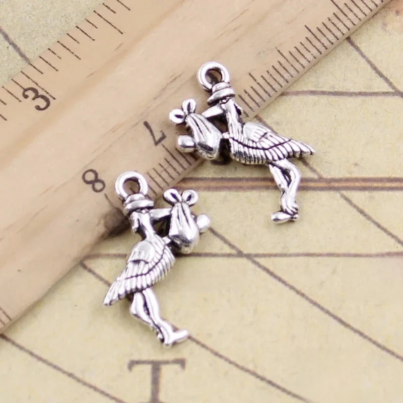 20 sztuk Charms bocian dziecko ptak 23x18mm tybetański brąz srebrny kolor wisiorki antyczny tworzenia biżuterii DIY Handmade Craft — zdjęcie 2
