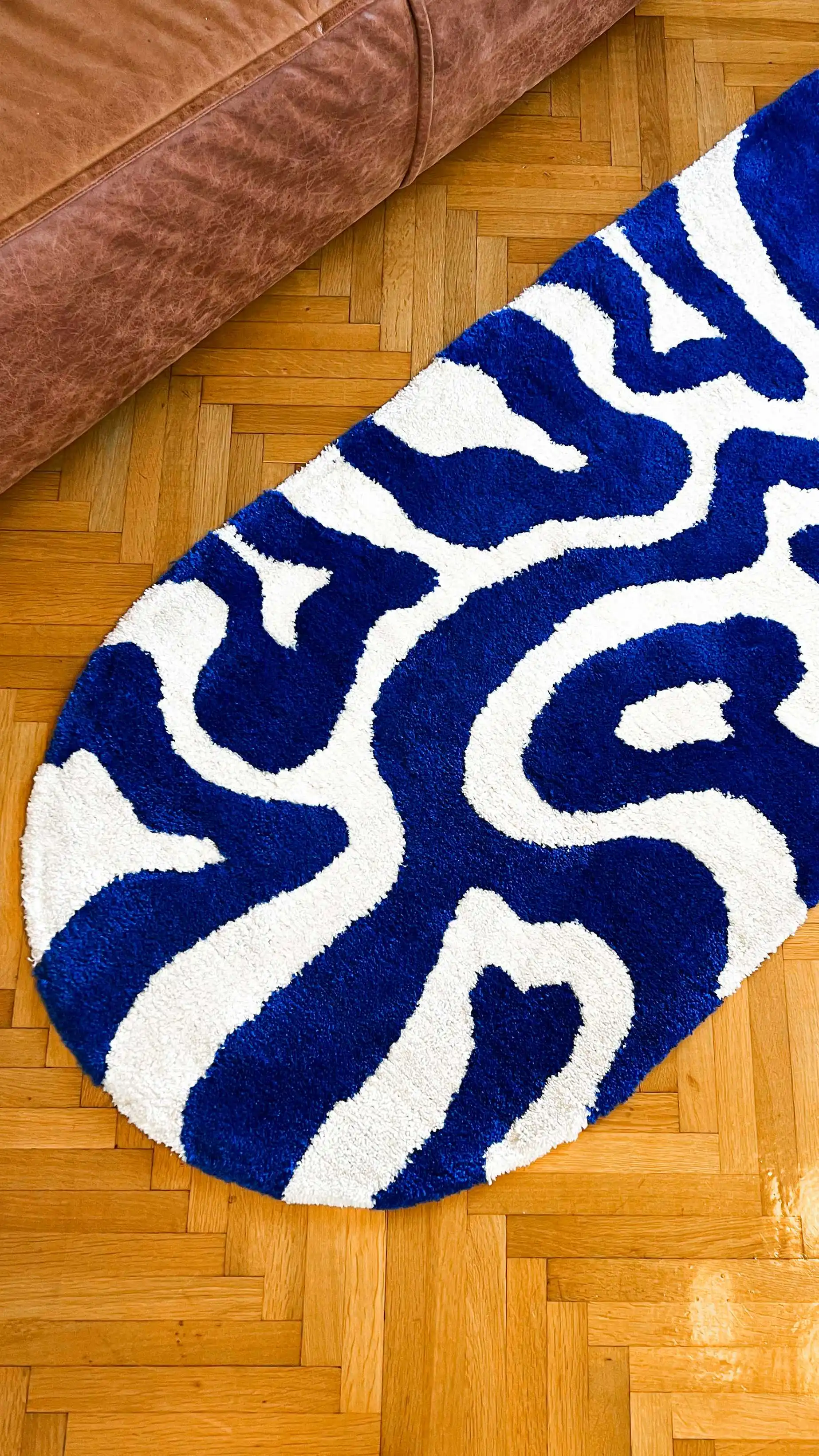 

Waves in a square, blue wave rug, tufting rug and abstract shapes, textile art. Blue carpet for gift. Ocean blue