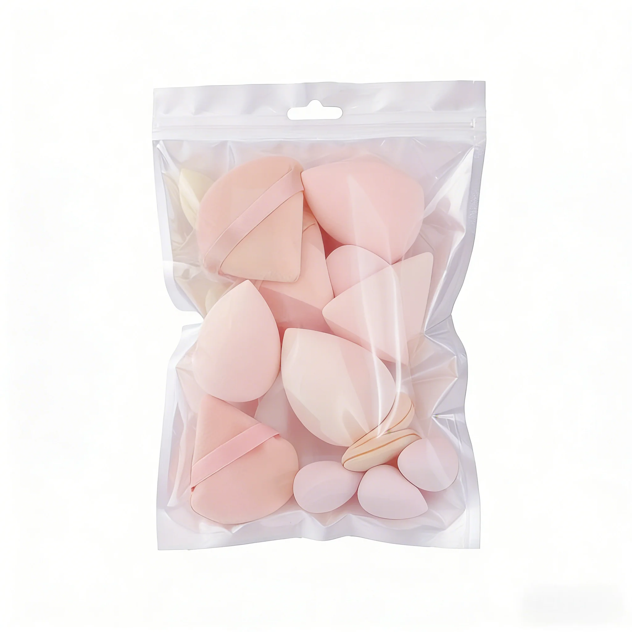 Un juego profesional de doce licuadoras de belleza suaves diseñadas para una aplicación de base líquida suave y impecable.