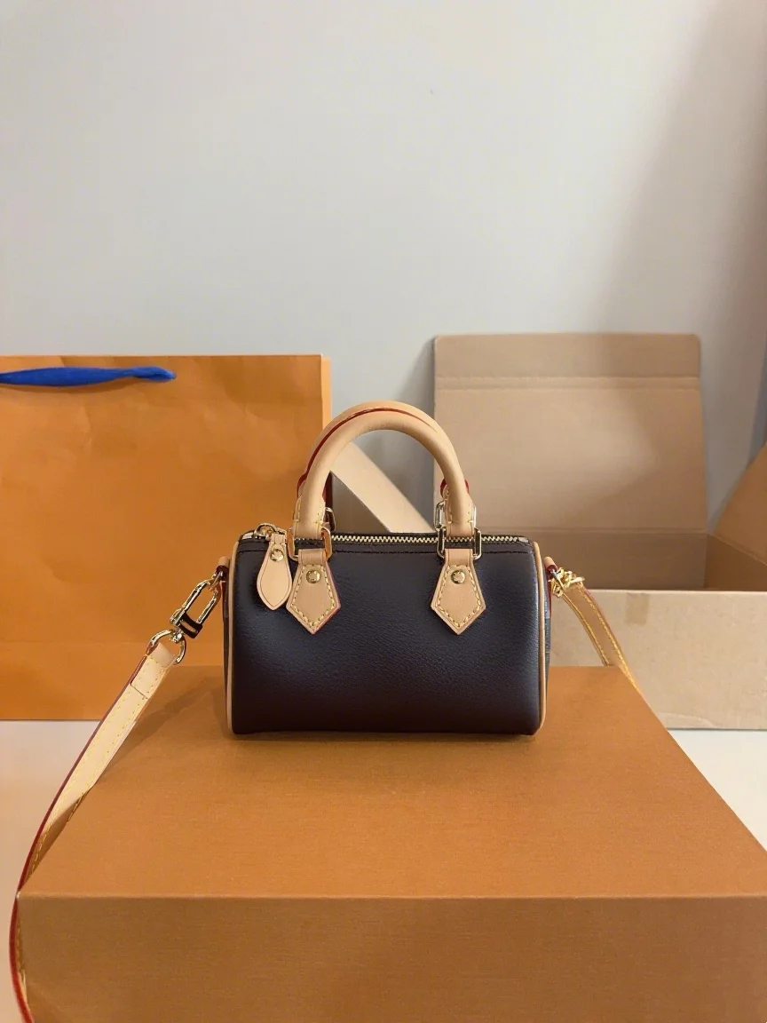 

2025 New 16X8X9 CM Fashionable Versatile bags leather cherry Portable can be carried on the shoulder no boxes