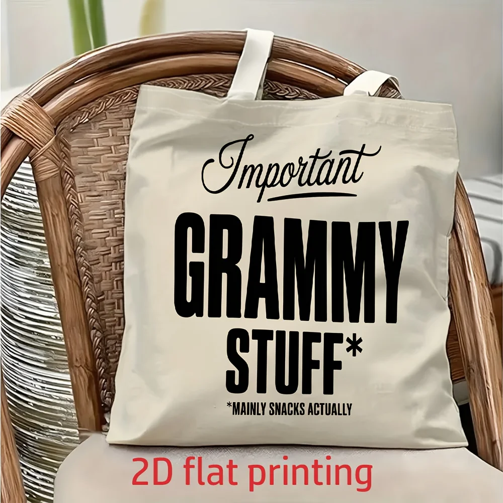 

1 Piece of Fun and Cozy Family-Themed "Grandma's Stuff" Canvas Shoulder Bag, Lightweight Foldable Tote Bag with Fixed Shoulder Strap, Reusable Shopping Bag, Perfect Gift for Commuting, Travel, Shopping, School, and Holidays