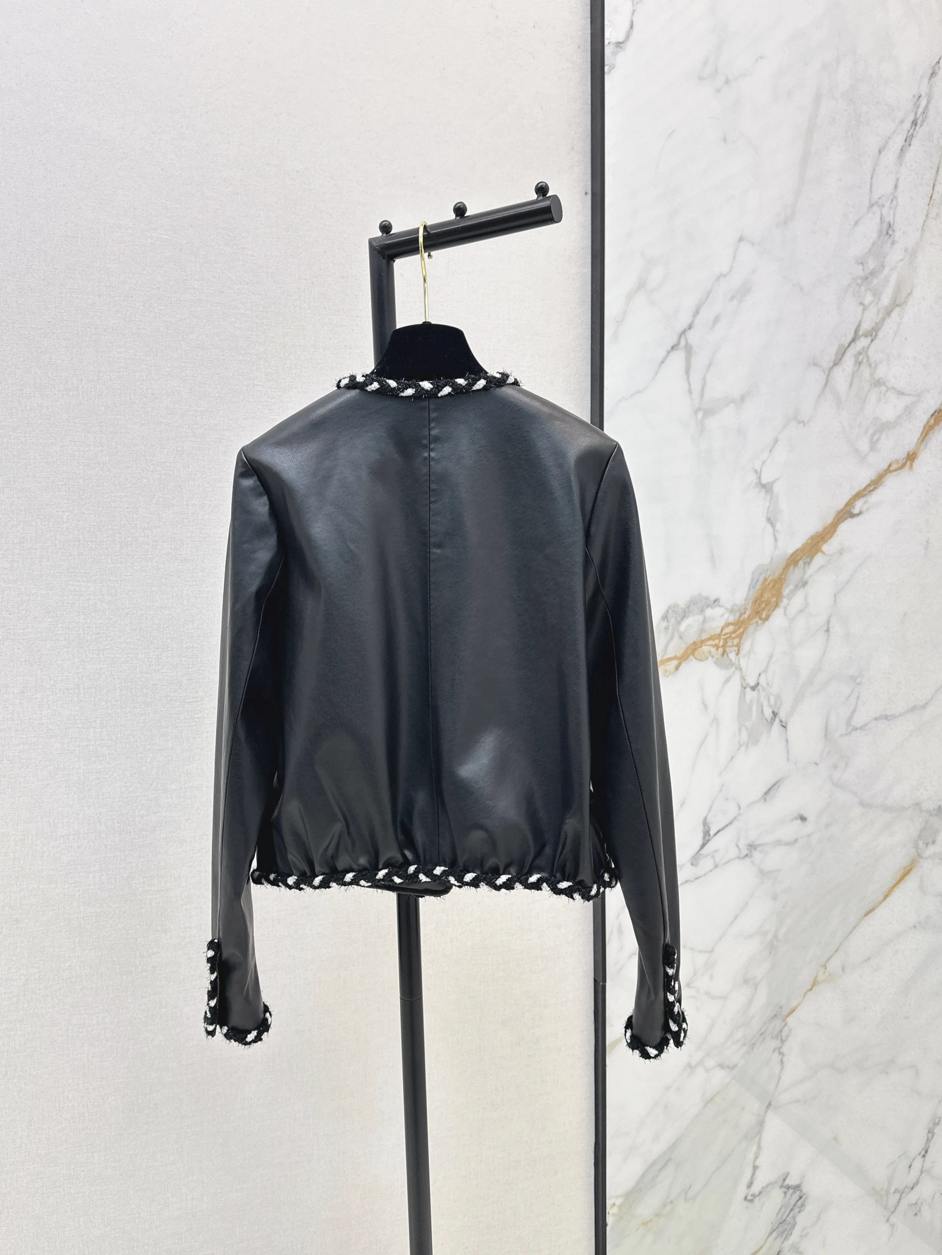 

Autumn And Winter New Women's Knit Edge Round Collar Leather Coat