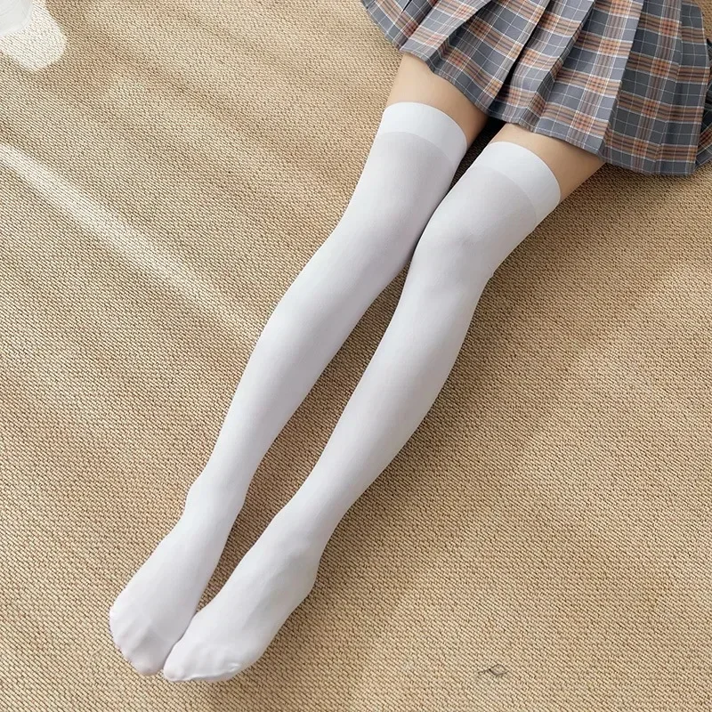 Chaussettes longues Sexy pour femmes, couleur unie, noir et blanc, au-dessus du genou, cuisses hautes, bas Lolita pour dames et filles, chaussettes chaudes