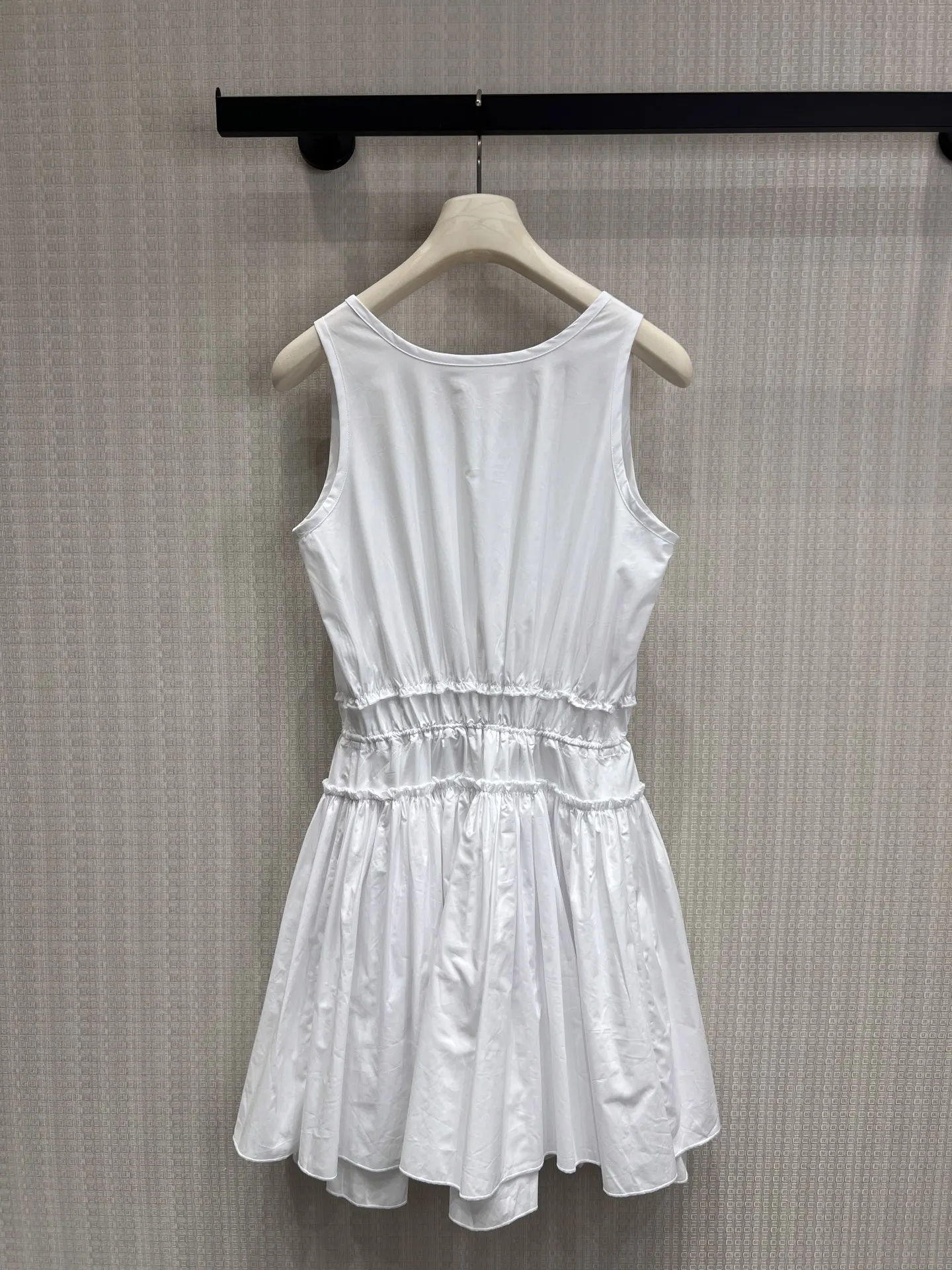 

2026 Summer Women's Crew Neck Sleeveless Ruched Waist Dress Asymmetric Flare Hem Mini Dress ZX18587