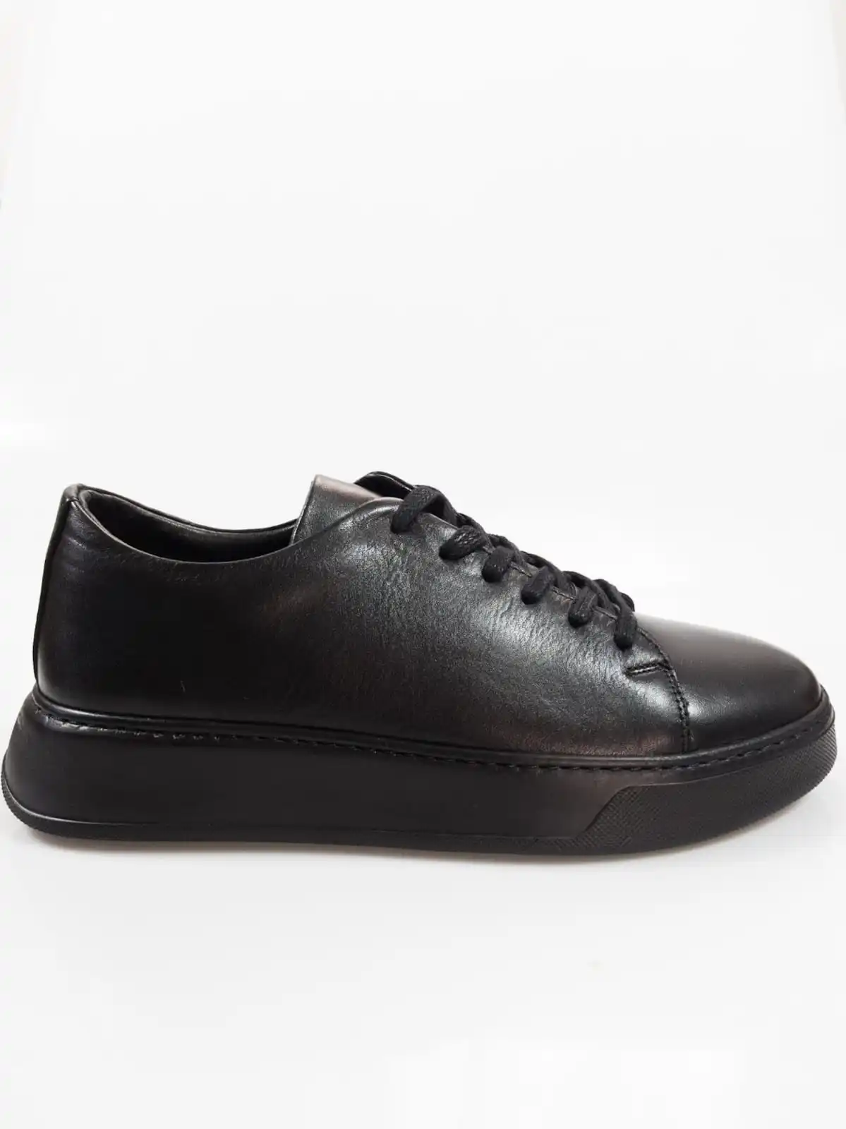 Genuine Leather Handmade Sneaker  type of footwear that is made by skilled artisans using high-quality leather material