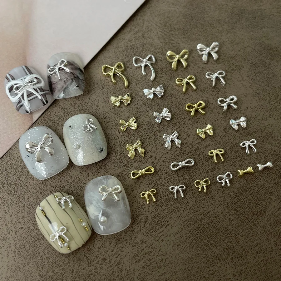 10 sztuk/worek luksusowa kokardka Nail Art Charms 3D stop muszka biżuteria do paznokci dekoracja ze strasem DIY akcesoria