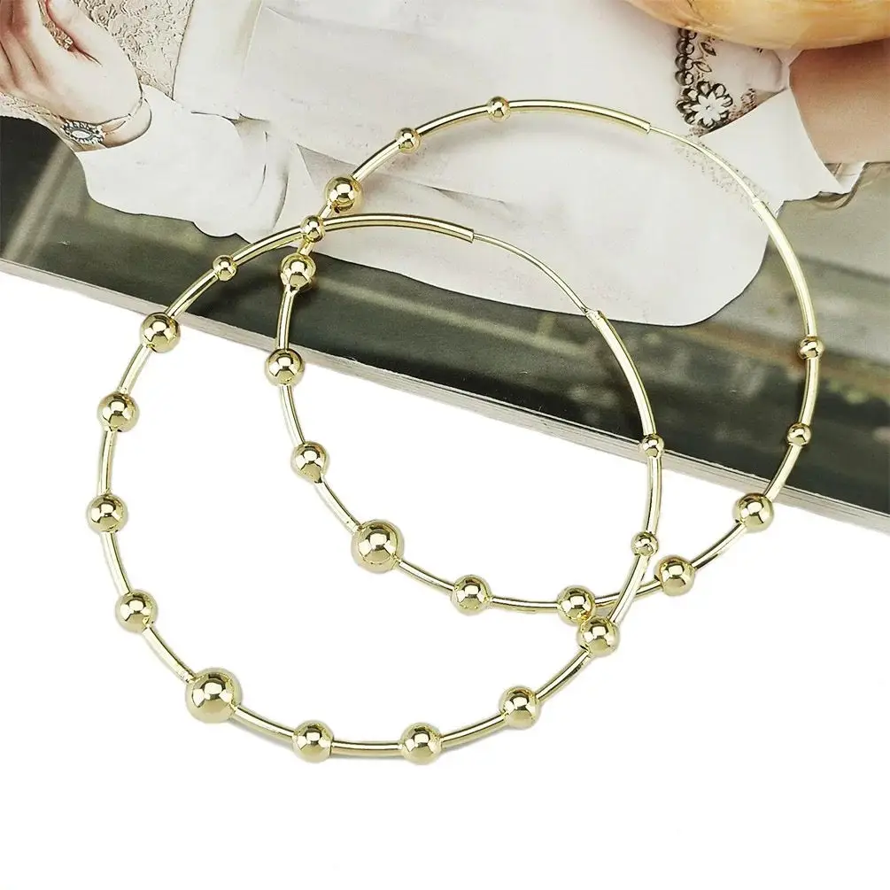 

Luxury Orbit Gold Beaded Hoop Earrings