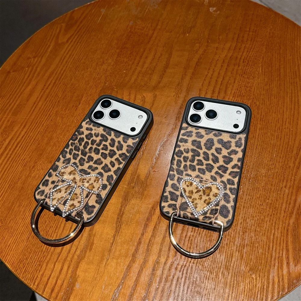 

Stylish and simple leopard print love bow holder mobile phone case, suitable for iPhone13/14/15/16/17ProMax, new protective case