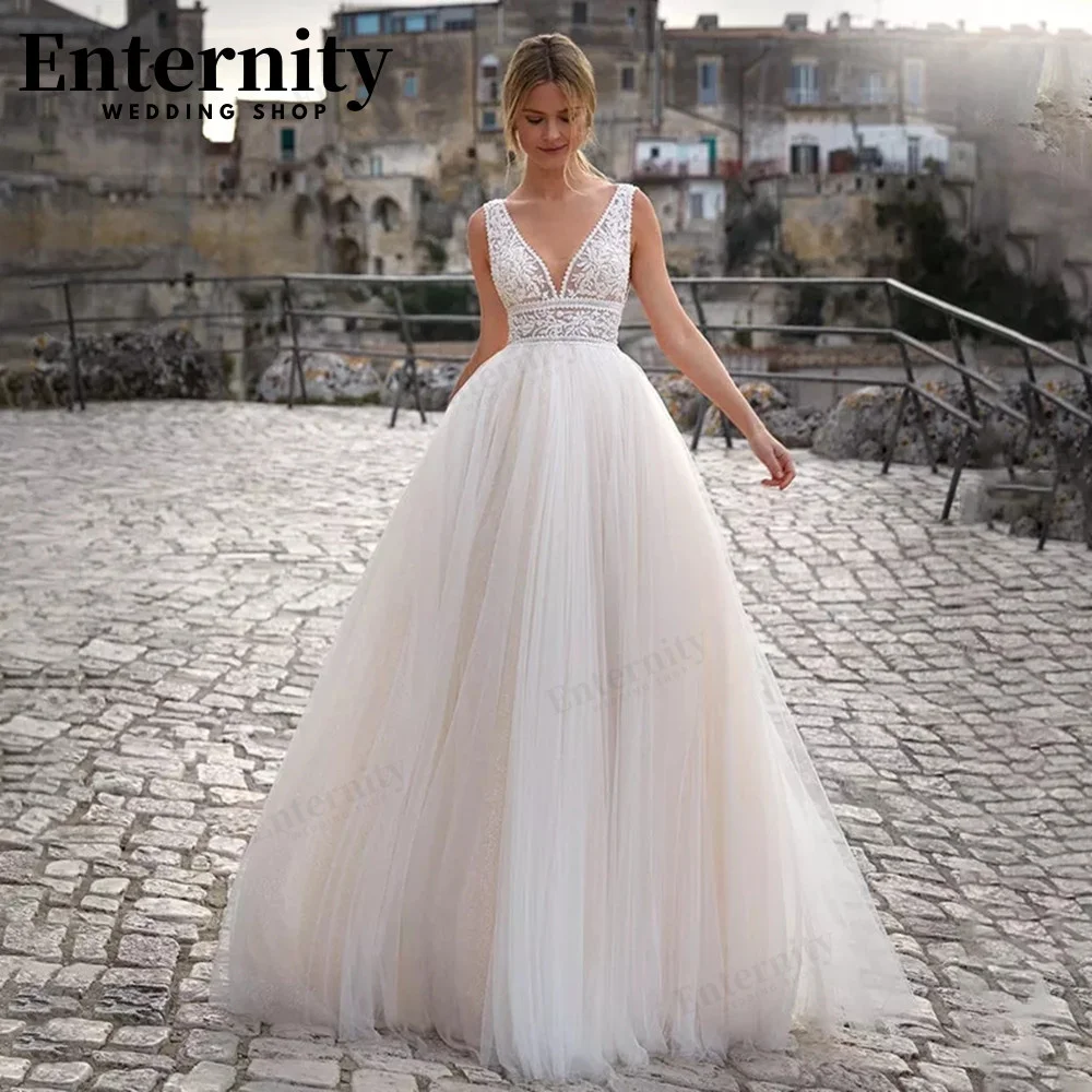 

Intriguing A-Line Lace Wedding Dresses V-Neck 2024 Sleeveless Boho Open Back Bridal Gown Pleats For Summer Robe De Mariée