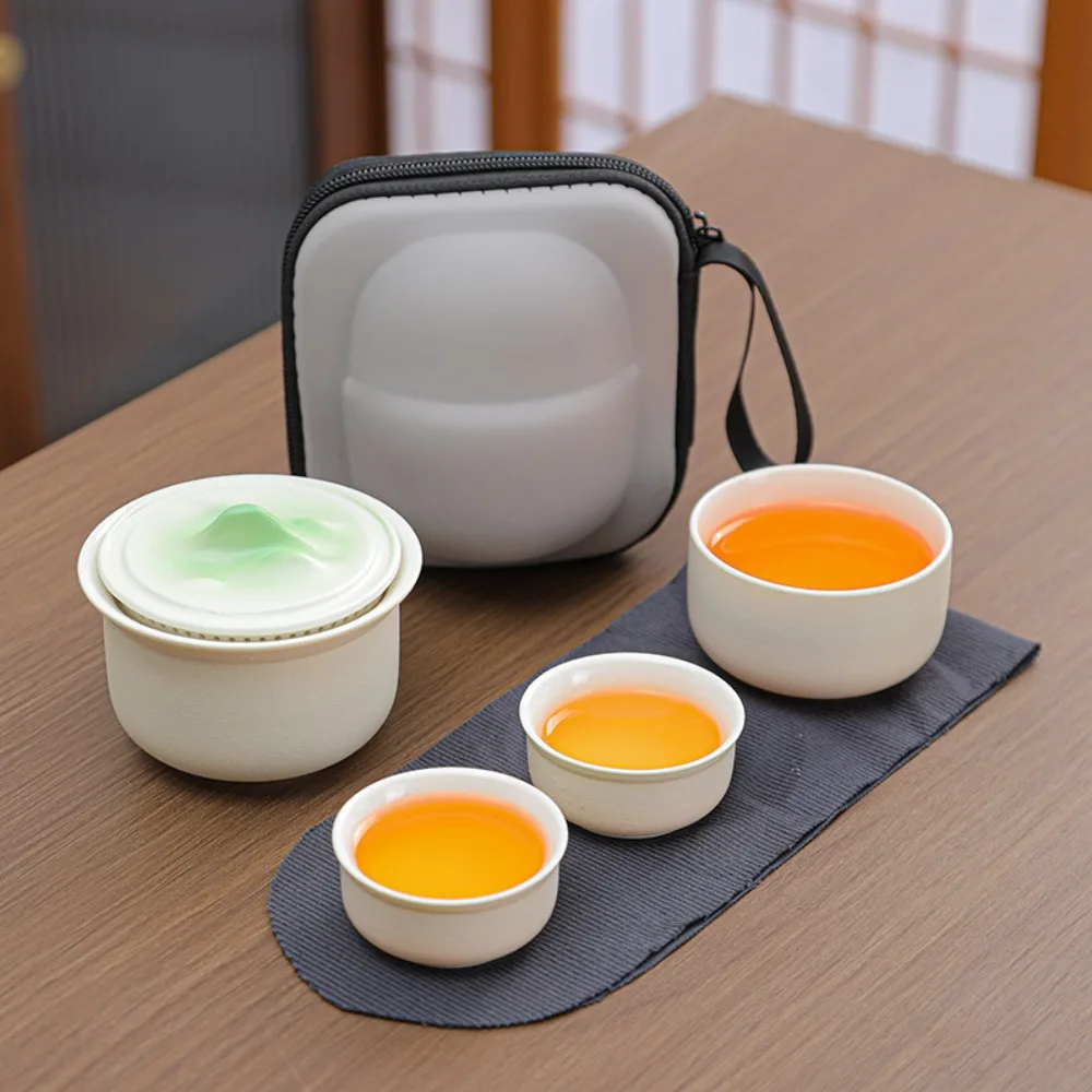 

Portable outdoor camping single person Kung Fu tea brewing travel tea set stoneware quick cup one pot three cups business gift