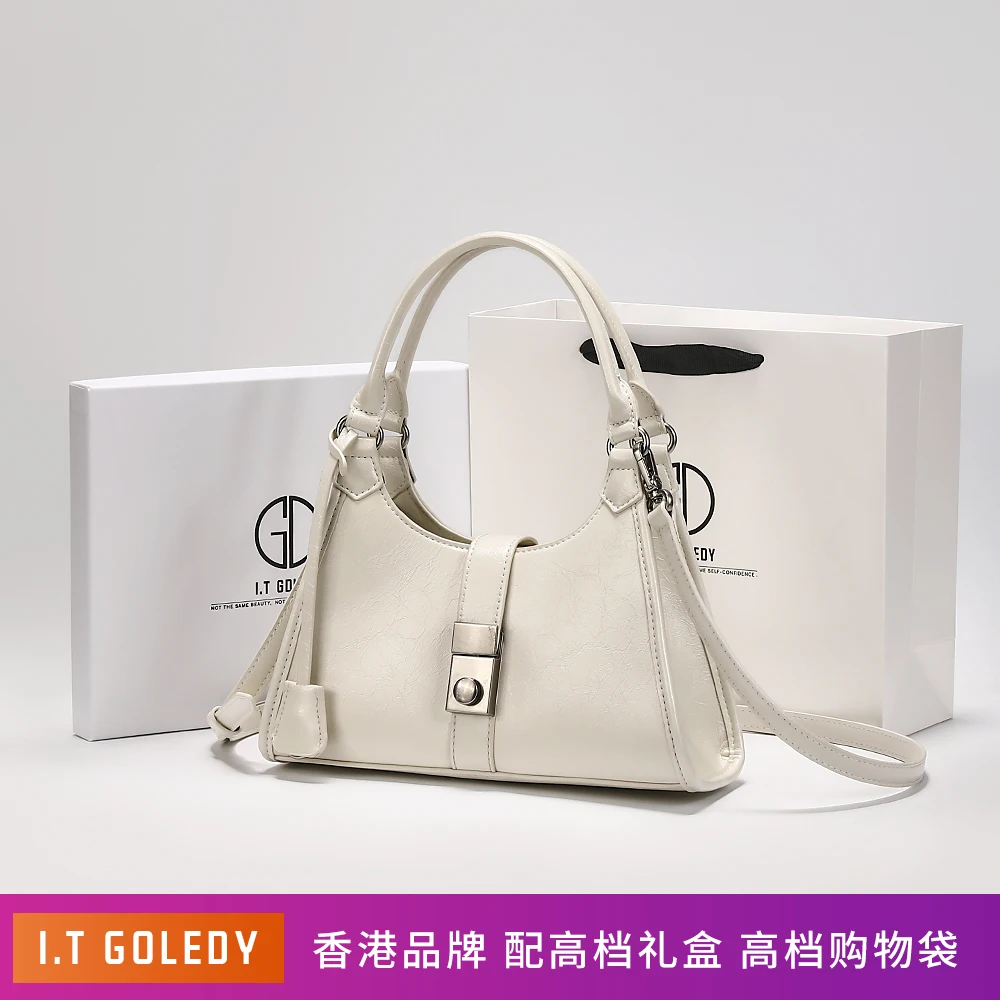 2025年のトレンディなレディースデニムレザーハンドバッグとメタルクラスプ付きショルダーバッグを日常使いにショーケースします。