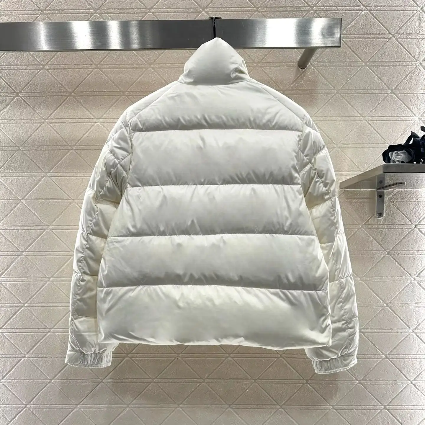 

2025 New Arrivals: Rectangular Embossed Stand Collar Black Down Jacket Made of Recycled Nylon and White Goose Down