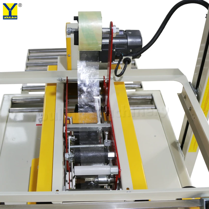 FXA6050คุณภาพสูงอัตโนมัติกล่องเครื่องซีล Up และ Down ไดรฟ์กล่องซีลกล่องปิดเทปบรรจุเครื่อง
