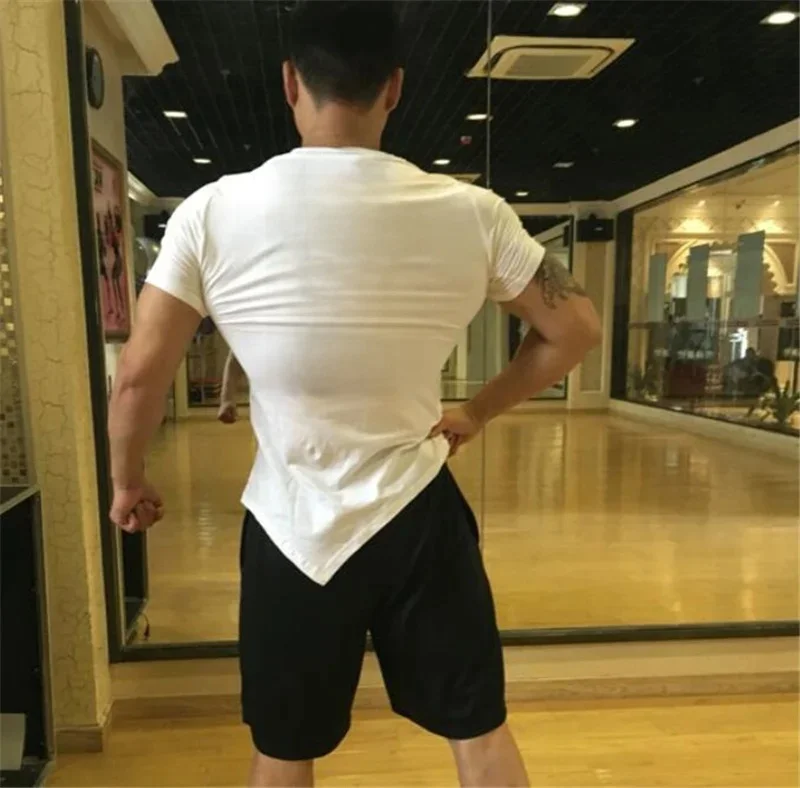 Muscleguys marka odzież gimnastyczna Fitness koszulka kulturystyka bez pracy nie ma kołaczy koszulka z nadrukiem męska koszulka slim fit — zdjęcie 2