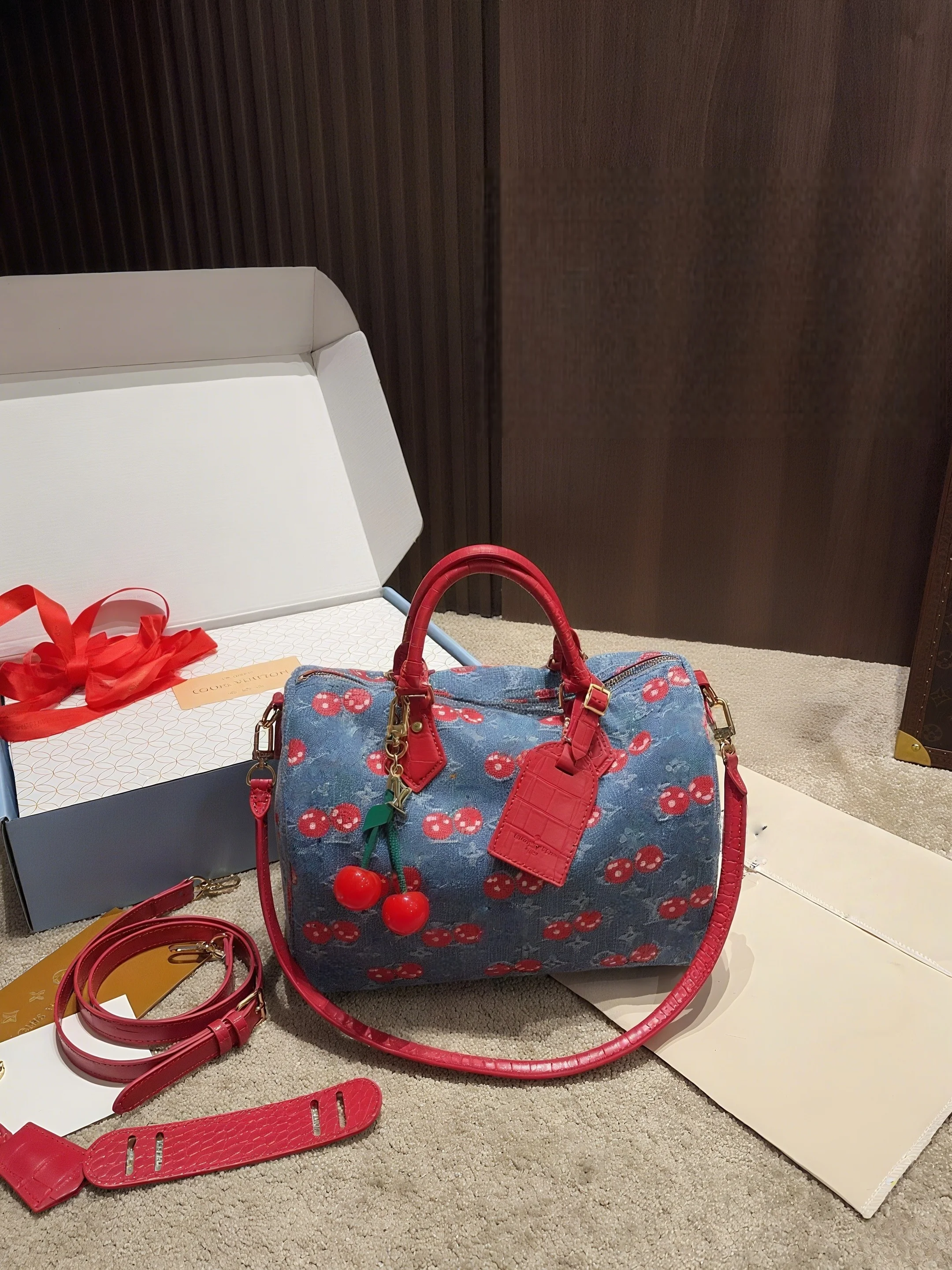 

2025 New and Fashionable Cherry Pillow High-quality and Multifunctional Accessory Handheld Crossbody Printed Bag ZXM025