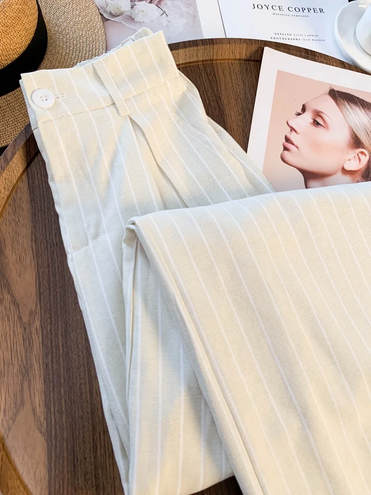 Dames abrikoos gestreepte elastische taille wijde pijpen broek Y2k Koreaanse geavanceerde gevoel gedrapeerde rechte pijpen casual kantoormeisjesbroek