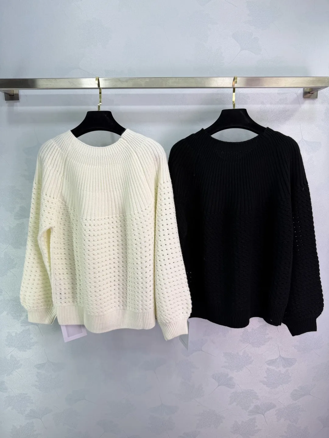 

Women's autumn and winter new needle style hollow knitted cardigan classic round neck zipper versatile sweater