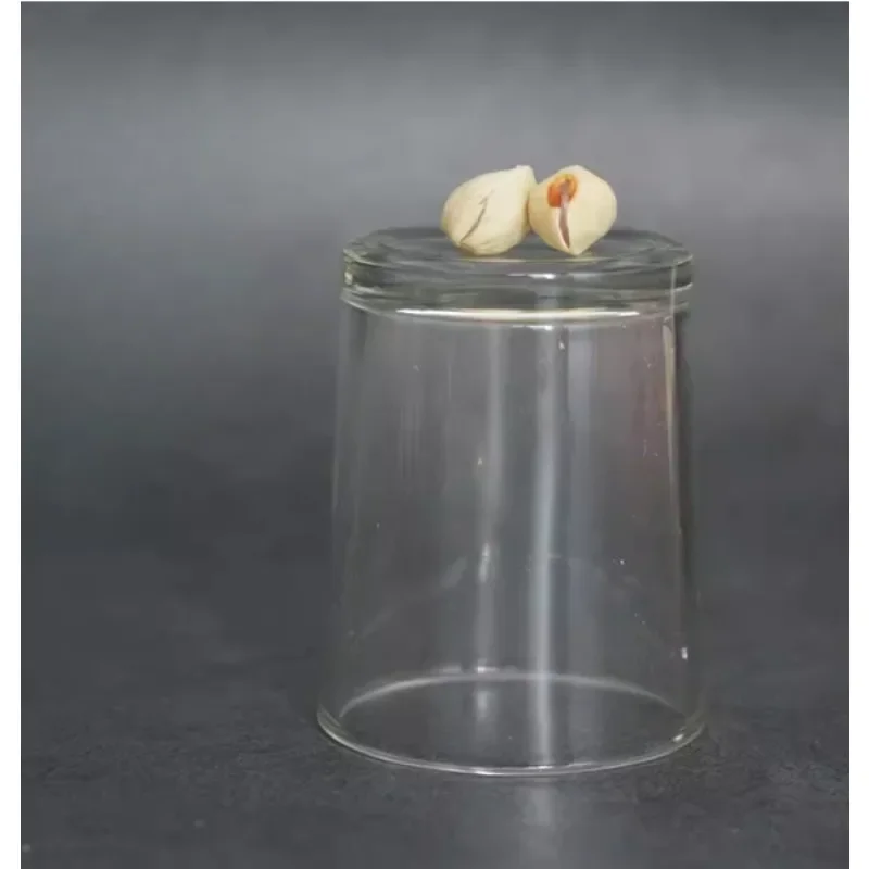 Pistache Kg à travers une tasse en verre, tours de magie, pénétration, magicien, gros plan, tension Icide, accessoires Gimmick, mentalisme, comédie