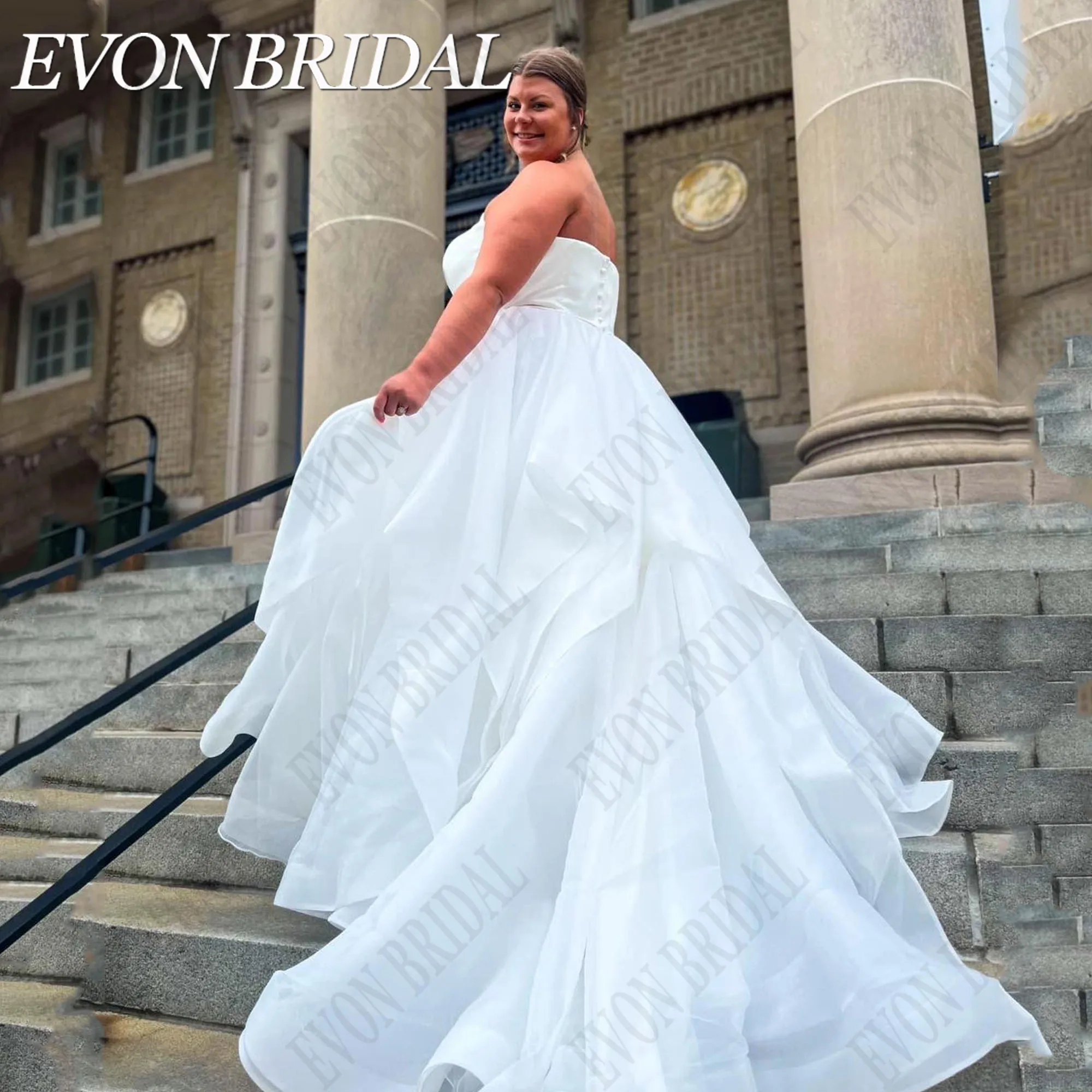 EVON-vestido De Novia sin tirantes para mujer, prenda De talla grande, sin mangas, De satén, escalonado, De tul, personalizadoEvon Bridal vestidos de bodas femeninos de talla grande sin tirantes vestidos de novia en ca