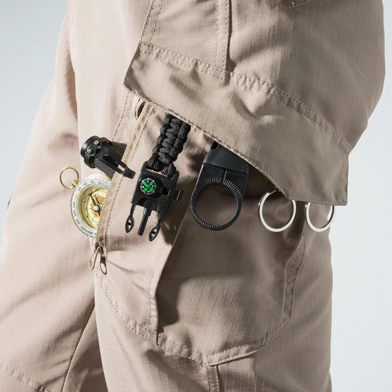 ชุดเอี๊ยมยุทธวิธีหลายกระเป๋าสำหรับผู้ชาย กางเกงทำงานกลางแจ้งกันลม ทนทานต่อการสึกหรอ และใช้งานได้จริงสำหรับการต่อสู้
