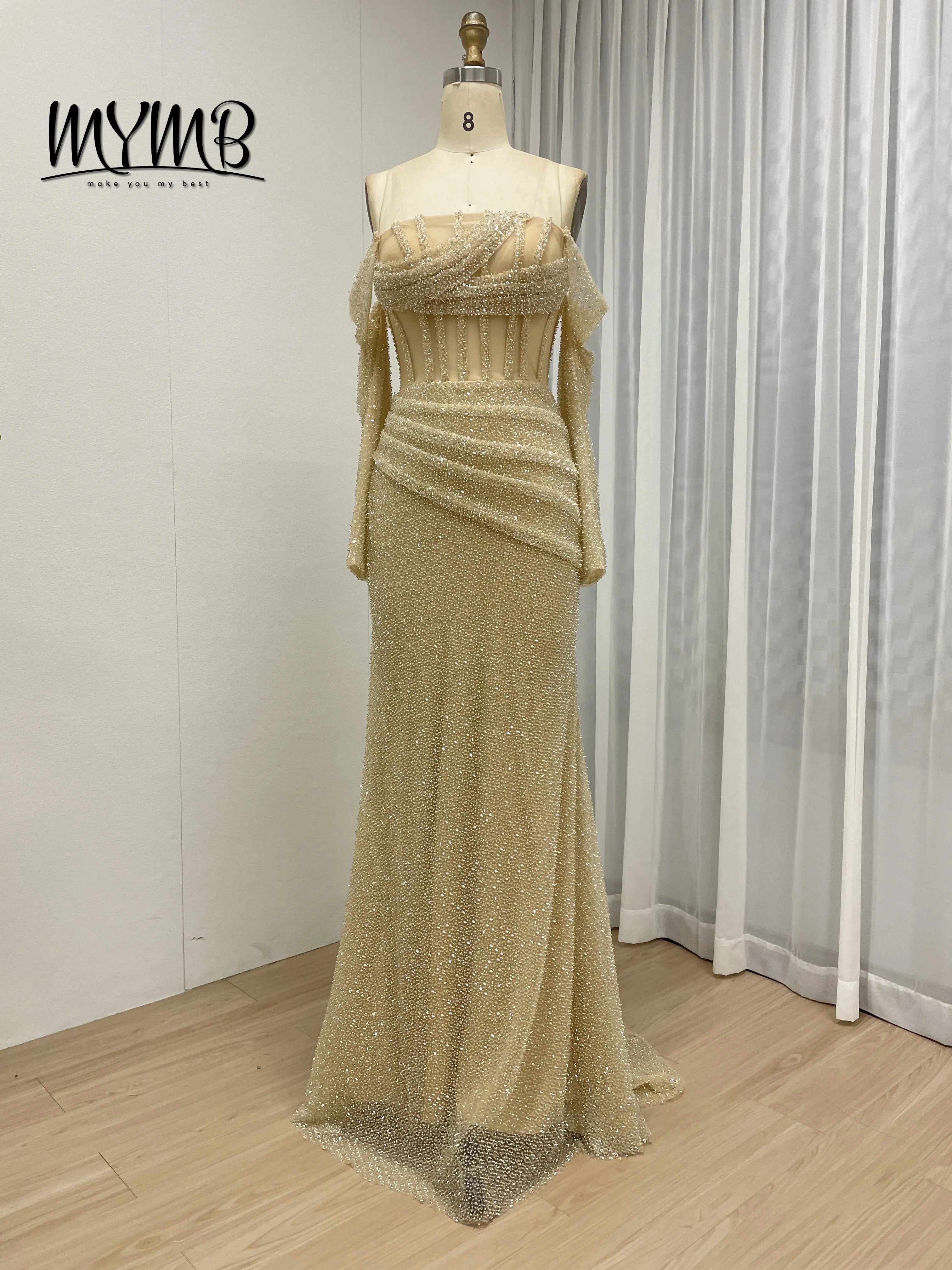 

MYMB Gold Beaded Evening Dress with Off-Shoulder Long Sleeve Ruched Corset Bodice Pearl and Mermaid Silhouette for Party MC20090