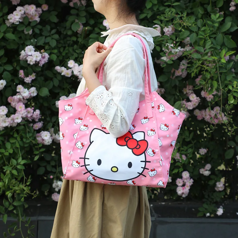 Sanrio hellobykitty borsa di grande capacità kawaii Kuromi Melody borsa a tracolla giapponese per ragazza carina borsa da viaggio in tessuto Oxford