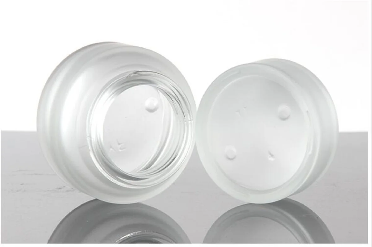 Barattolo di vetro smerigliato da 30G con coperchio nero essenza/gel per gli occhi/crema giorno notte/idratante/acido ialuronico labbra bottiglia di vetro per imballaggio cosmetico