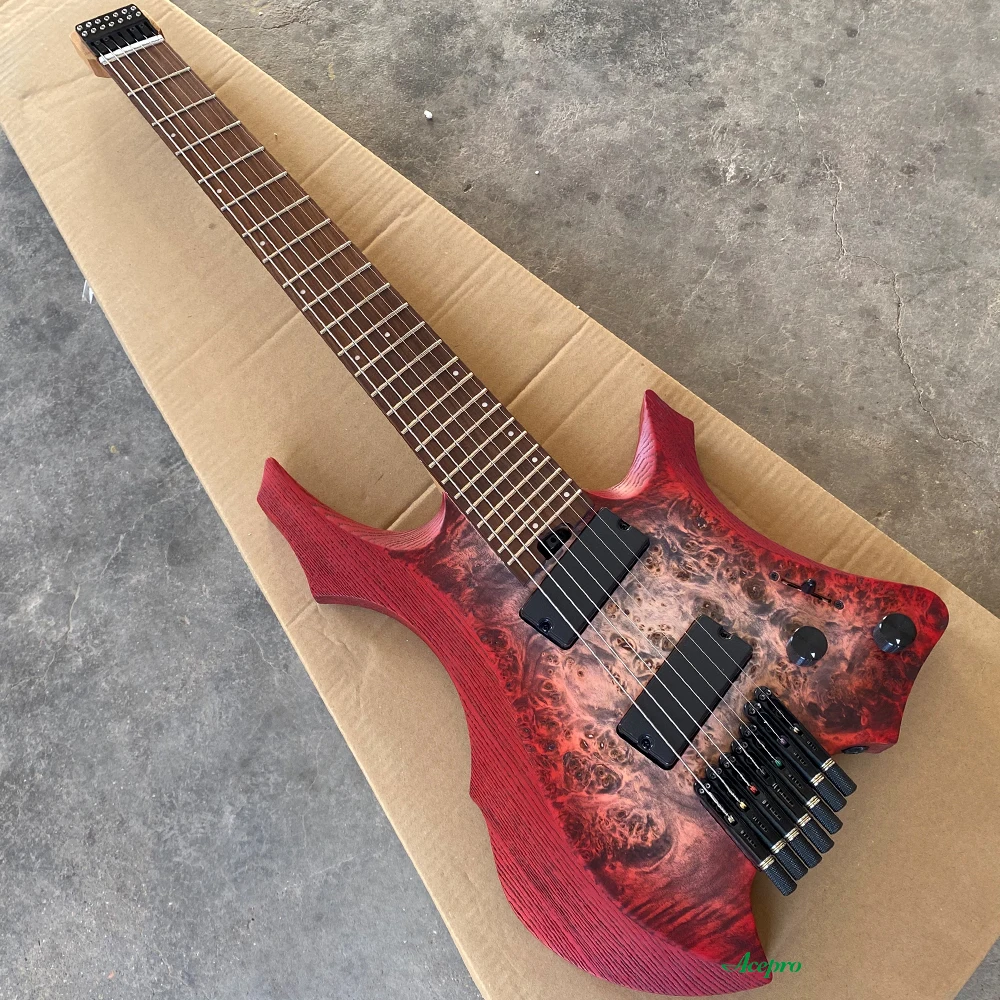 

7-струнная красная безголовая электрогитара, активные звукосниматели с ладами, 9-кратный гриф из жареного клена, гиды из нержавеющей стали Jumbo