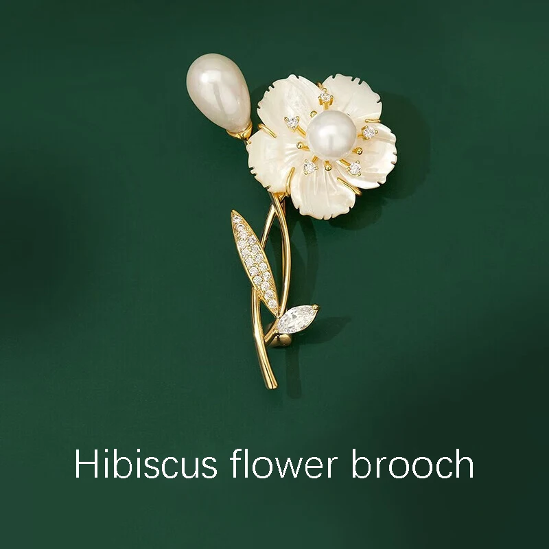 

CrsimeK Hibiscus Flower Brooch, embellished with imitation pearls, a fashionable jewelry accessory for women.Jewelry brooches