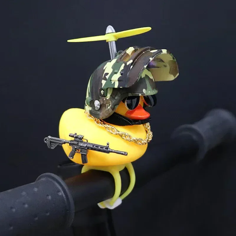 AliExpress Rubber Duck Toy Bike Motocycle Car Ornaments Black Pink Yellow Duck with Weapon Propeller Helmet Car