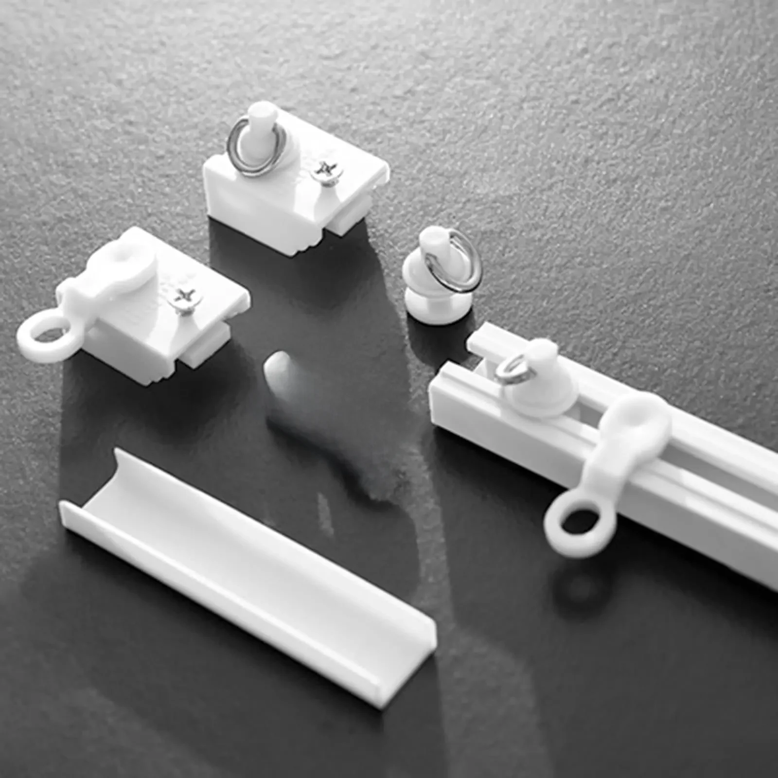 Accessoires de rail de rideaux auto-adhésifs