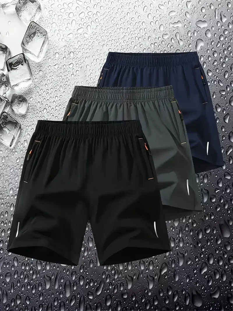 Confezione da 3 pantaloncini estivi da uomo in tinta unita, eleganti pantaloni con cerniera e strisce riflettenti, adatti per la corsa, lo sport e l'uso quotidiano