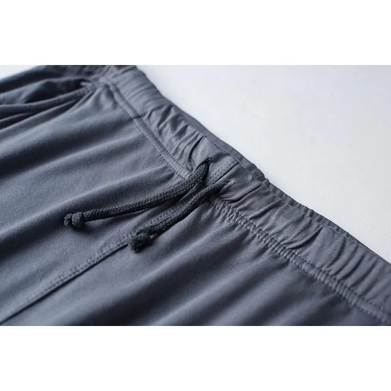 Pijamas modales de dos piezas para hombre, pantalones de manga corta, delgados, talla grande, ropa de casa deportiva suelta, traje de ropa de dormir, primavera y verano, nuevo