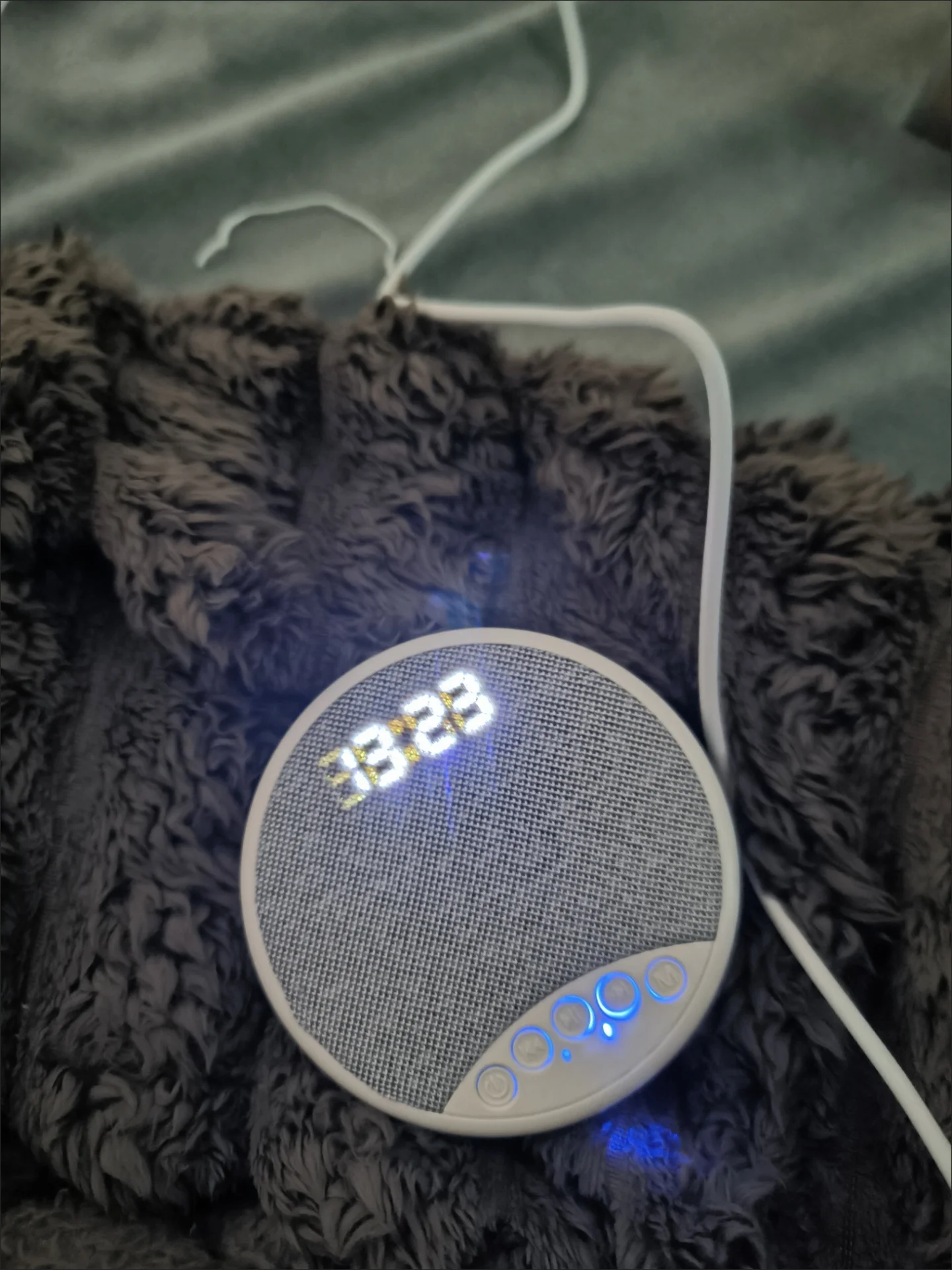 Customer photo showing how slim the PillowTone is