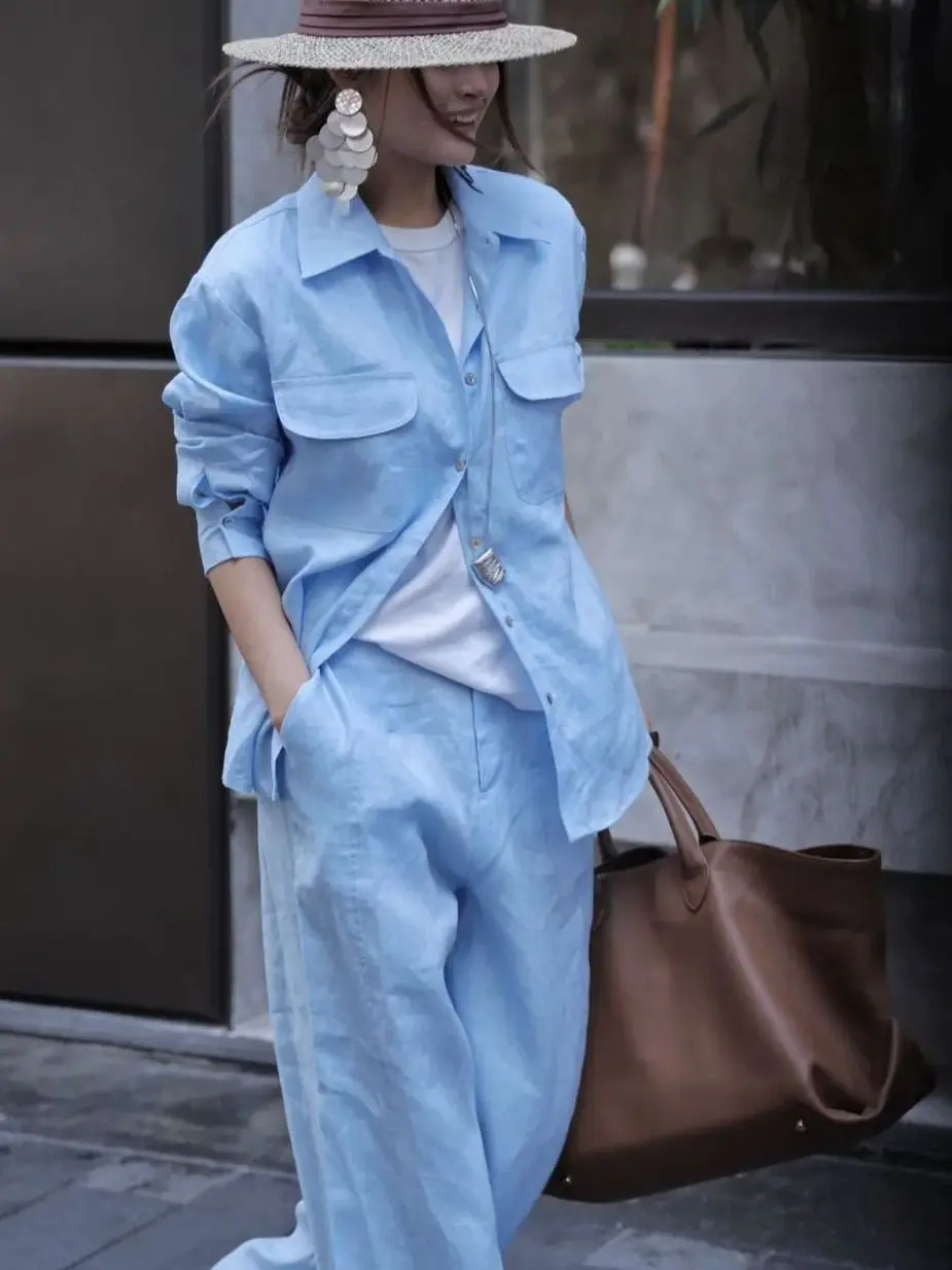 Terno de calças de linho puro feminino mínimo no início do outono