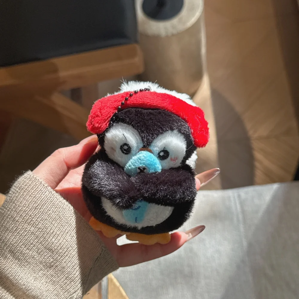 

Cute penguin hugging fish headphone protective case, suitable for AirPods 4/3/2 Pro/2/4, with pendant, cute new protective case