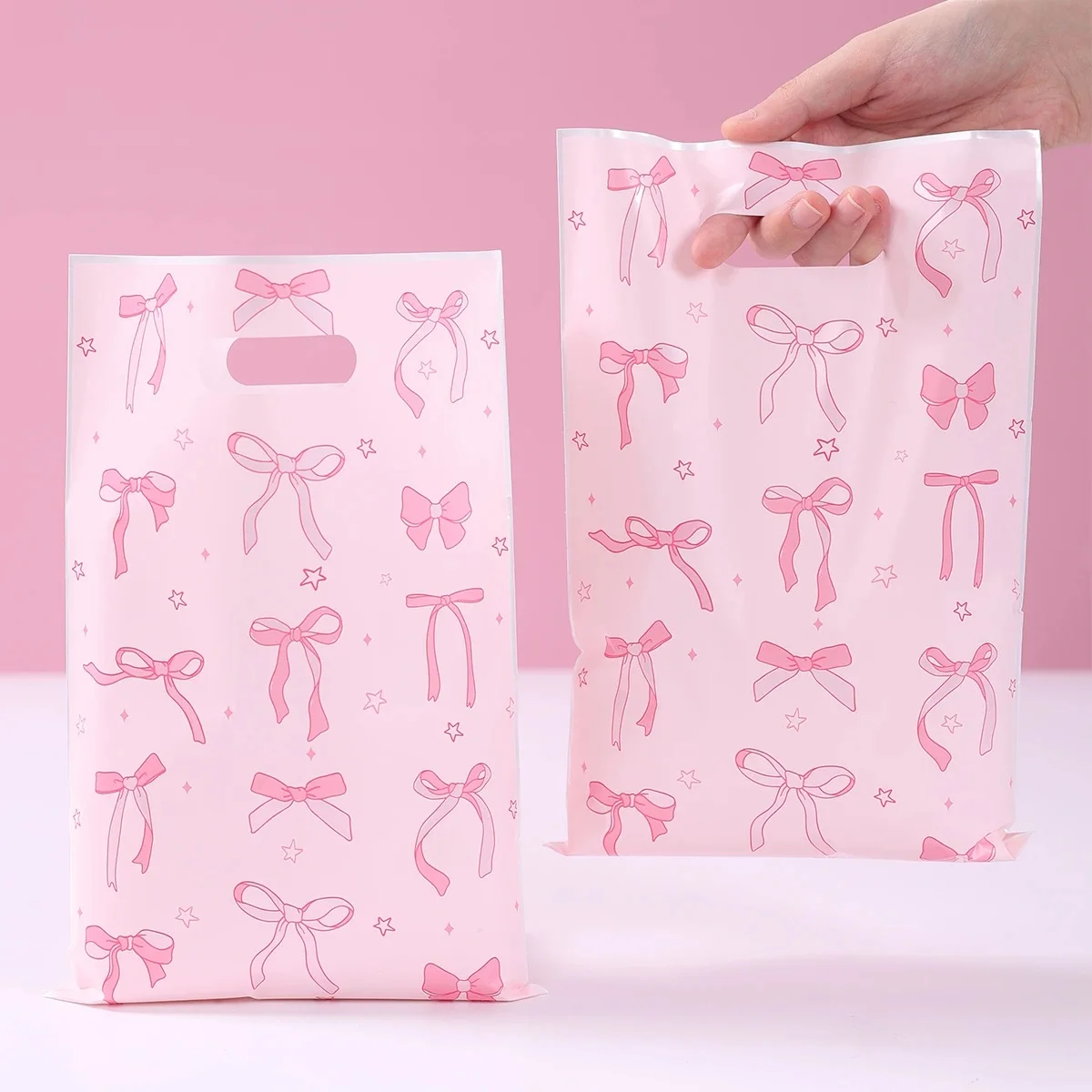 Sac d'emballage cadeau rose avec nœud doux, 10/25/50 pièces, sacs de collation pour gâteaux et bonbons, fournitures de réception-cadeau pour bébé d'anniversaire pour enfants filles, décor de fête de