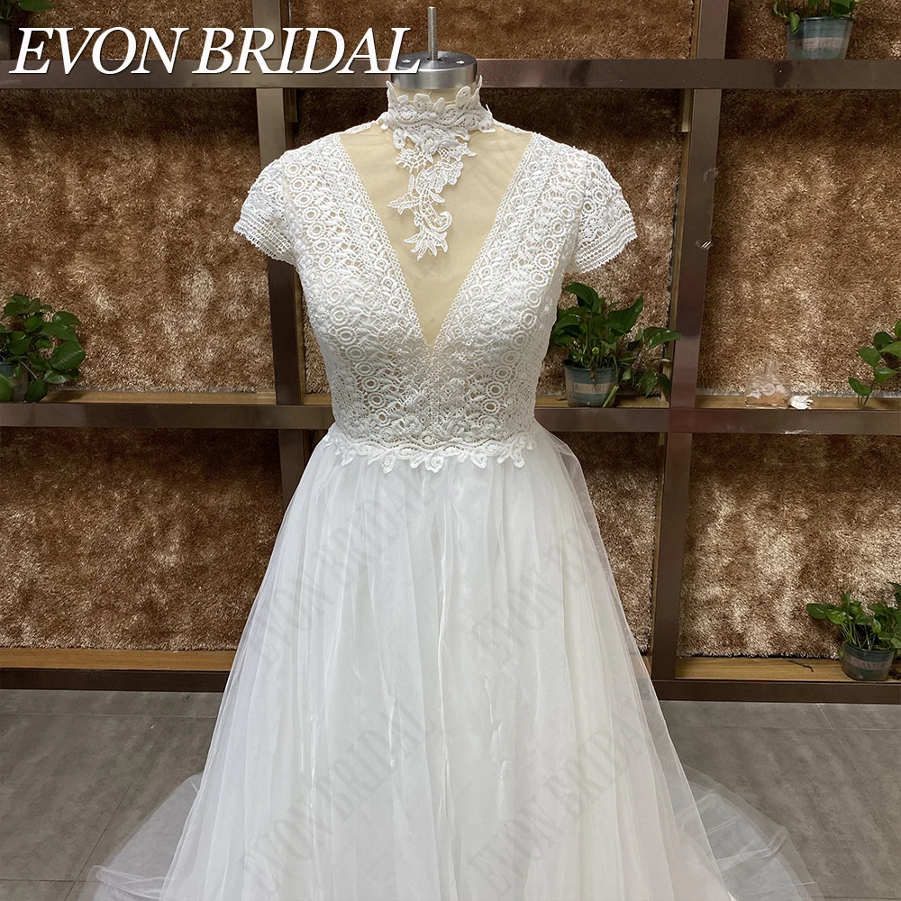 EVON BRIDAL Boho cuello alto vestidos de novia mangas casquillo de encaje apliques Robe De Mariée Para las mujeres de tul A-Line Ilusión Botones sin espalda vestido de novia de imagen real vestido de novia civil de tre