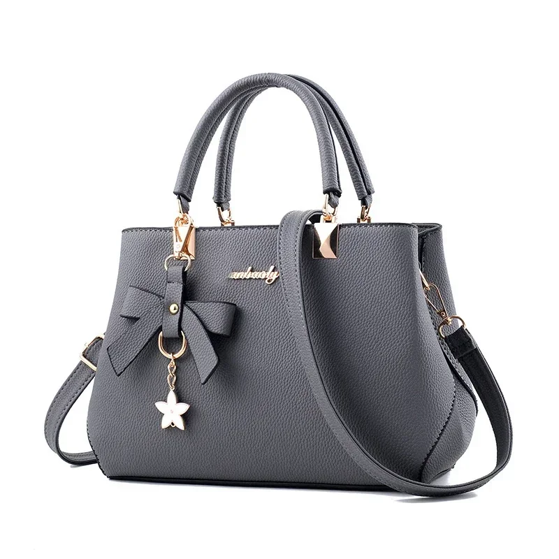Damskie torby listonoszki z kwiatowym wisiorkiem, modne torebki damskie do biura, czyste torebki damskie, nowe torby na ramię crossbody. — zdjęcie 2