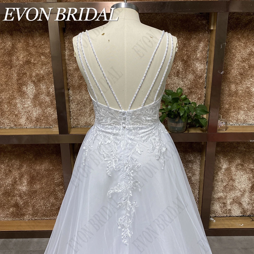 EVON BRIDAL Элегантные свадебные платья для женщин 2024 Бисер спагетти ремни robe de mariée V-образным вырезом кружева без спины платья невесты Boho Пользовательские Сделано тюль без рукавов платье невесты с пуговицы ш