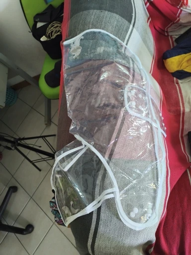 Customer review photo for Clear Water-Resistant Dog Raincoat with Harness Opening