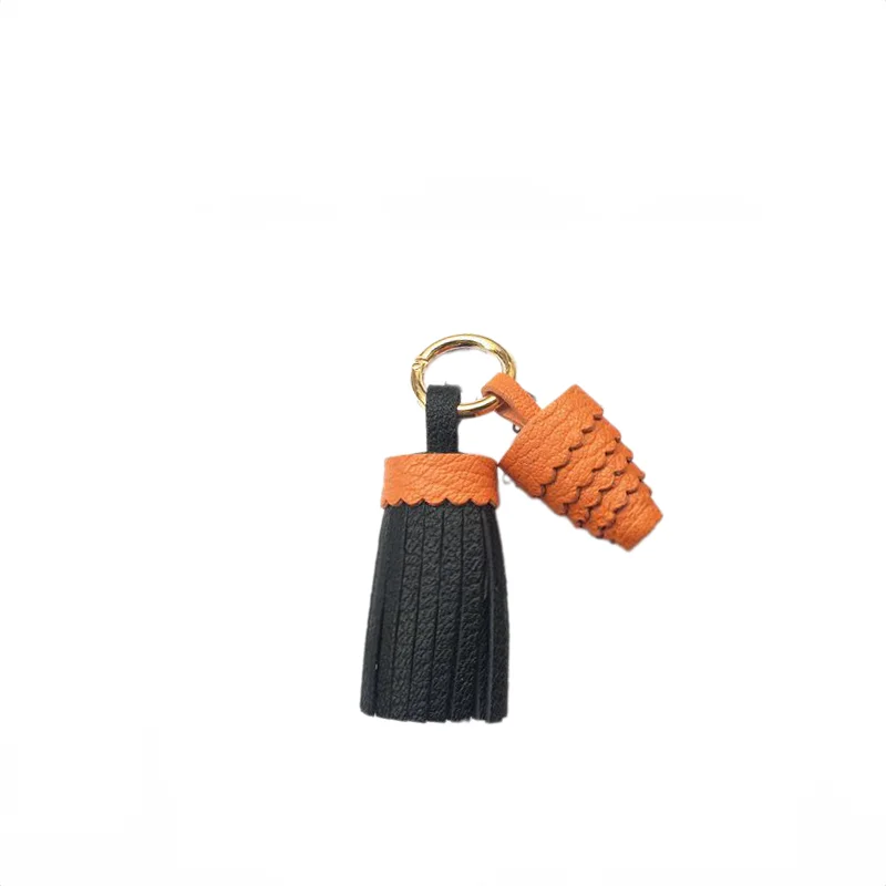 

Handcrafted Genuine Leather Bag Charm Fashion Forward Accessory Perfect for Trend Savvy Women Versatile Stylish Keychain